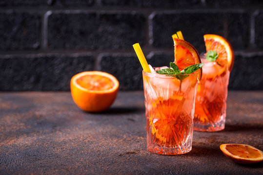 Negroni cocktail with orange and ice