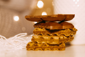 freshly baked chocolate chip cookies on rustic wooden table