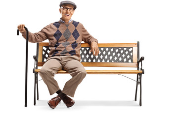 Happy senior gentleman sitting on a bench