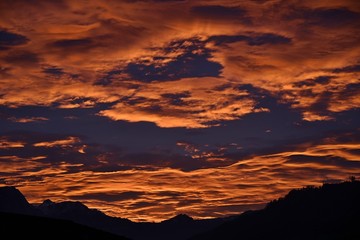 blood-red sunset in the sky