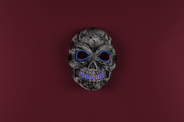 scary skull mask on a red background
