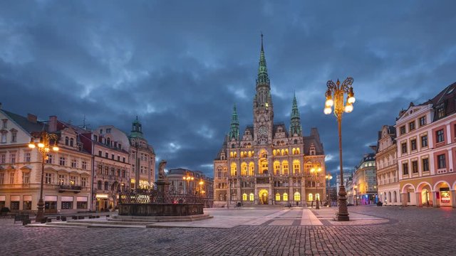 Liberec, Czechia. View of main square with Town Hall building at dusk (static image with animated sky)