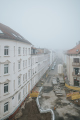high angle view of road construction with fog