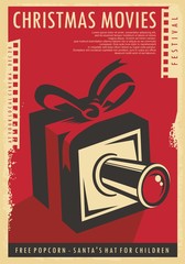 Christmas movies festival retro poster design with Christmas gift, film strips  and movie camera. Vintage vector illustration for cinema holiday event on red background and old paper texture. 