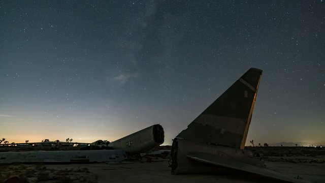 Astro Timelapse of Milky Way over Abandoned B-52 in Desert