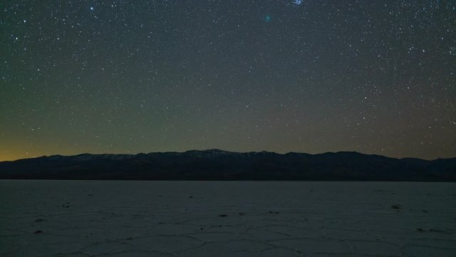 Astro Timelapse of Geminids Meteor Shower over Badwater in Death Valley