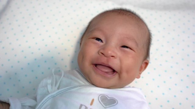 Close up of Asian newborn baby