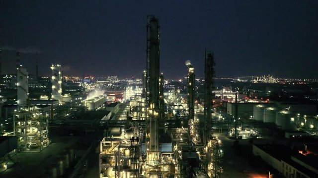 oil refining at night shoot by drone
