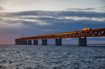 Öresund bridge with truck and sundown 