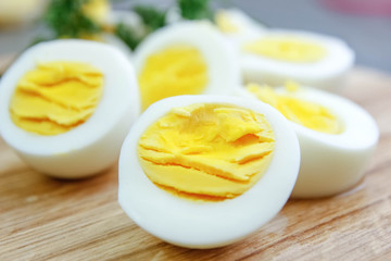 boiled eggs on a wooden background.