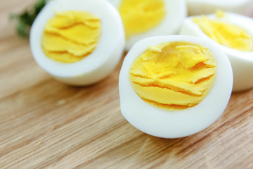 boiled eggs on a wooden background.