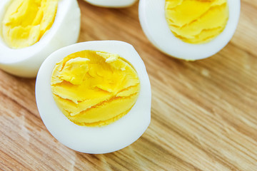 boiled eggs on a wooden background.