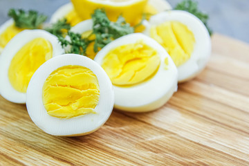 boiled eggs on a wooden background.