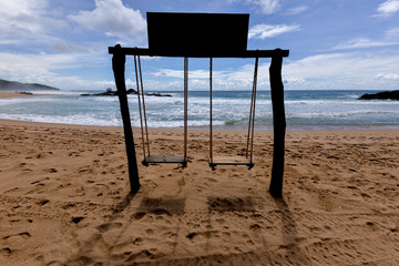 swings on the beach