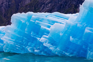 Textured Blue Iceberg in Ocean