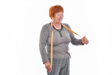 A woman looking a measuring tape