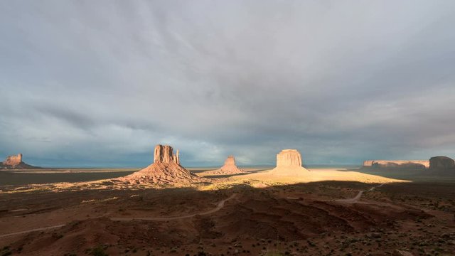 Timelapse Wide Shot of The Mittens at Sunset in Monument Valley, Utah