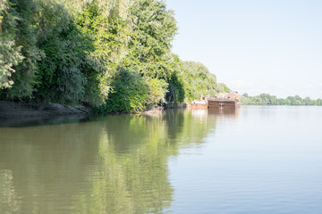 Fototapeta premium barge on river receives the cargo