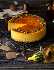 pumpkin cheesecake with caramel sauce and seeds on top 