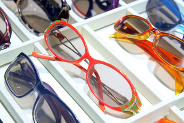Color frame sunglasses on the shelf