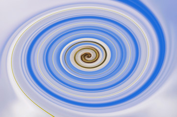 Illustration, blue spiralling burst from centre. Suitable for use as a background or texture.