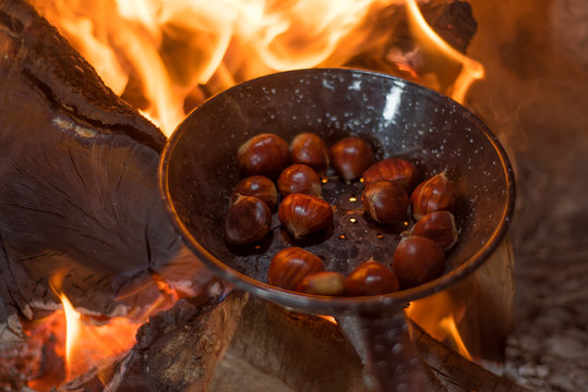 Roasting Chestnuts On Fire In A Pan