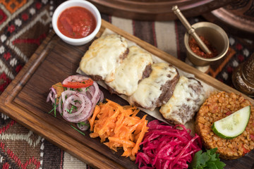 Middle Eastern Style Kofte Meatballs with Melted Cheese and Condiments, Kofte Kebab