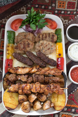 Middle Eastern Style Assorted Grilled Meat, Kebabs, Beef, Lamb, Chicken and Vegetables.