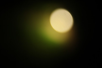 Abstract bokeh lights on a black Background Defocused