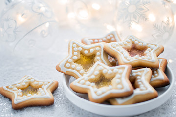Homemade Christmas star shape sugar caramel cookies on white background 