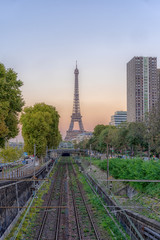 Sunset view of Eiffel tower with railway in west Paris in autumn