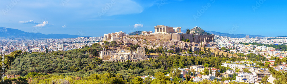 Wall mural Panorama of Athens with Acropolis hill, Greece. Famous old Acropolis is a top landmark of Athens. Landscape of the Athens city with classical Greek ruins. Scenic view of remains of ancient Athens.