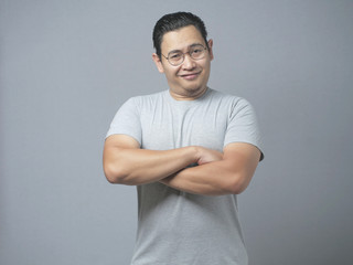 Young Funny Asian Man Smiling Happily