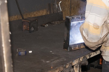 man working on metal part