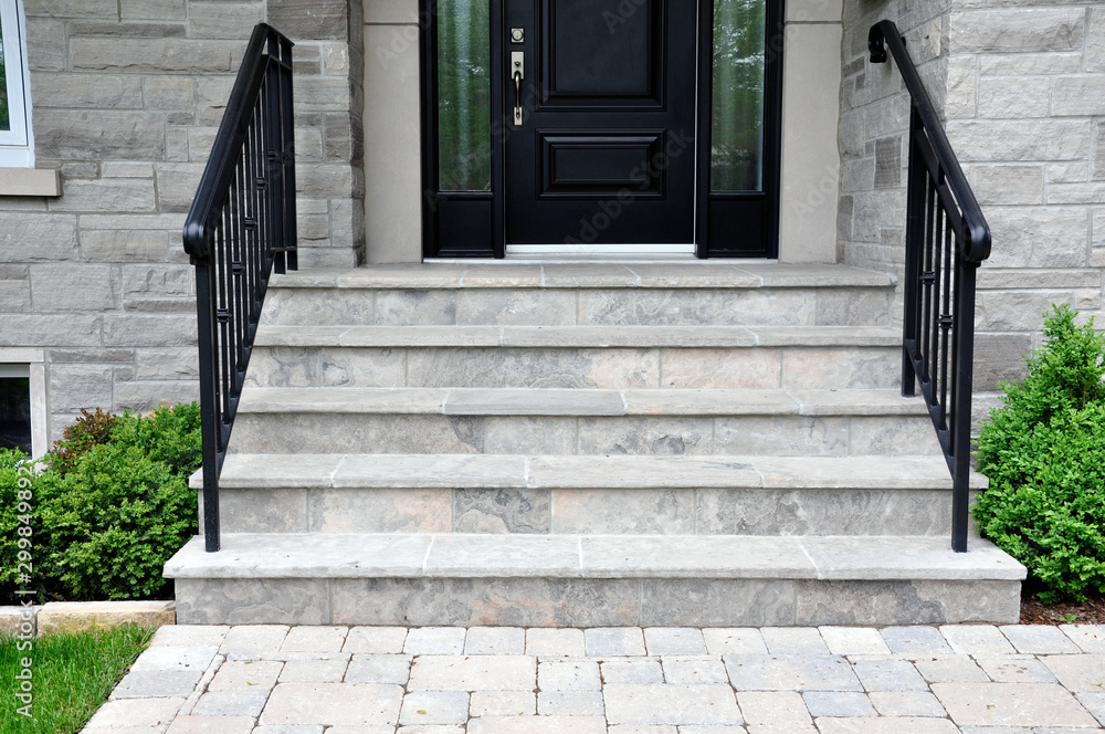 Wall mural flagstone applied to the original concrete veranda, natural stone steps, and a tumbled paver landing