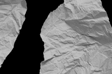 pieces of torn paper texture on black background, copy space.