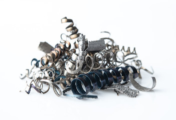 Pile of scrap metal shavings isolated on white background