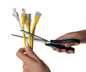 Scissors cutting the network cable on white backgrund