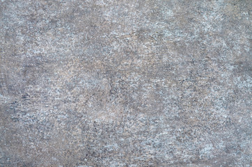 Textured grey surface of polished granite as a background