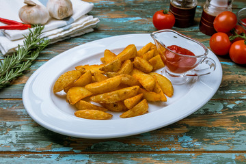 The potatoes wedges on the Board