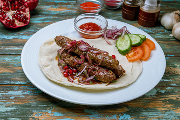 kafta in beirut on wooden table