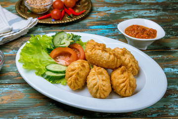 hoshour mongolian cuisine on wooden table