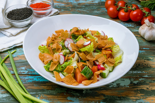 fatouche salad on wooden table