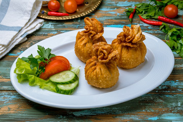 hoshour mongolian cuisine on wooden table
