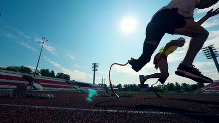 Running start held by two disabled sportsmen - Powered by Adobe