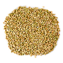 Heap of green buckwheat groats isolated on a white background. Top view.