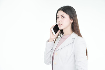 Portrait beautiful businesswoman holding smartphone for talking with business partnership.