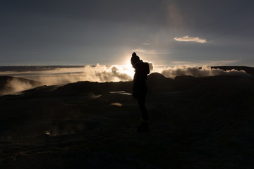 sunrise in the middle of clouds in middle of Amazing salt desert Andes Bolivian