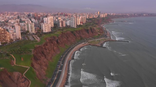 STATIC MIRAFLORES Aerial view of Miraflores and Costa Verde HighWay at sunset in Lima, Peru.