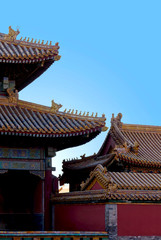 ancient chinese architecture. historic buildings against the blue sky. beautiful traditional patterns. The Imperial Palace in Beijing